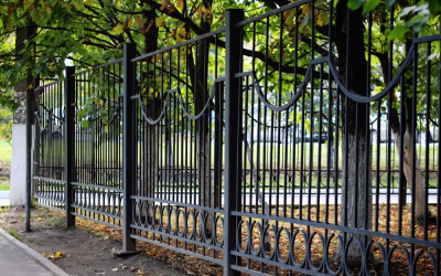 What Fencing Material Is Best for Sloping or Uneven Ground?